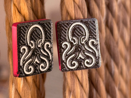 Abysso's drop earrings. STUDS